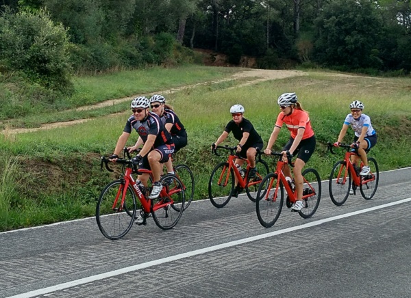Cycling between the fields of the Costa Brava country side